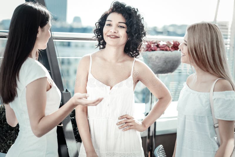 Joyful positive women enjoying their meeting