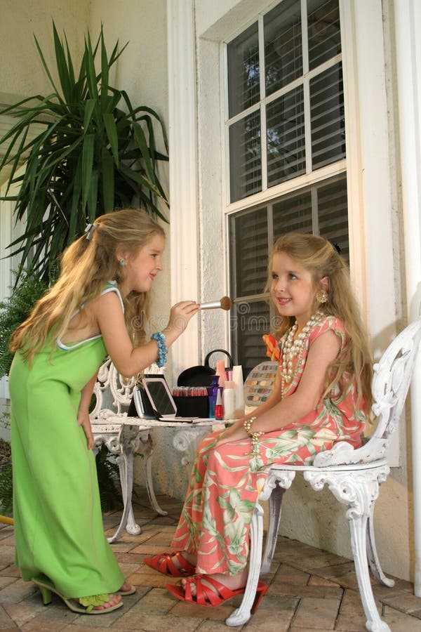 Identical twin girls playing dress up. My models (and myself) love to see our images in action. When possible, please let us know how our images have helped your project. Tearsheets are greatly appreciated. Thanks in advance....Andi. Identical twin girls playing dress up. My models (and myself) love to see our images in action. When possible, please let us know how our images have helped your project. Tearsheets are greatly appreciated. Thanks in advance....Andi