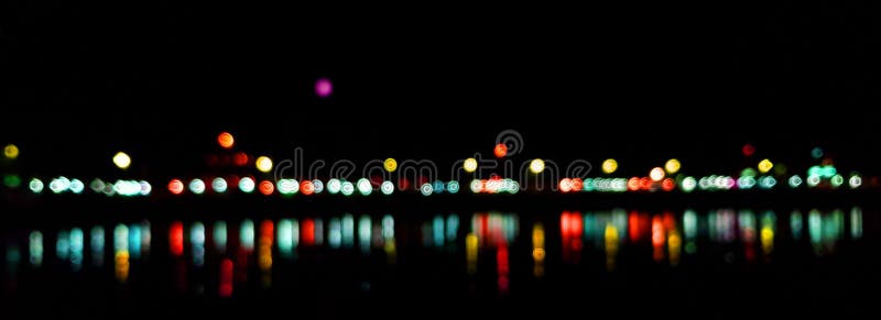 Lekka noc przy miasta bokeh plamy abstrakta tłem Błękitny czerń f zdjęcie stock Lekka noc przy miasta bokeh plamy abstrakta tłem Błękitny czerń f zdjęcie stock