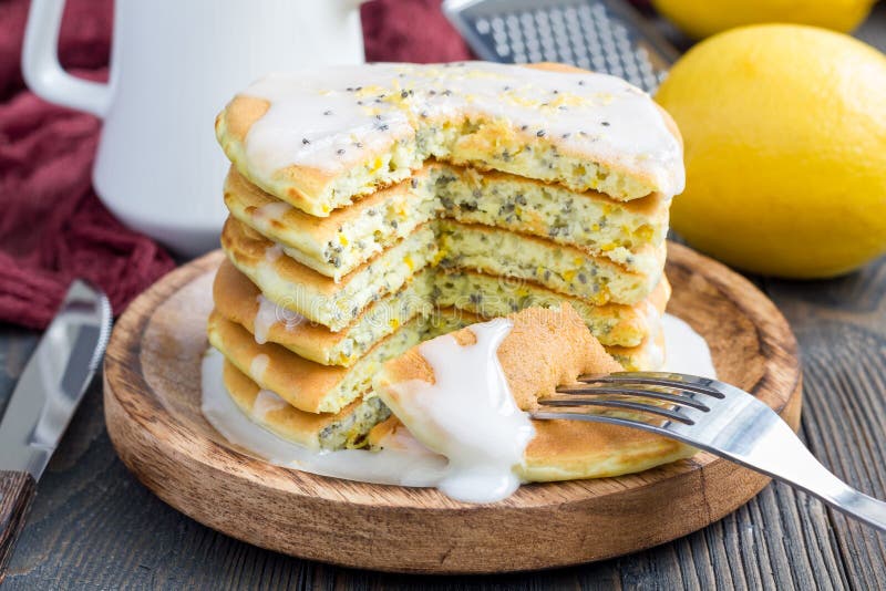 Lemon and chia seed pancakes with citrus glaze, horizontal royalty free stock photos Lemon and chia seed pancakes with citrus glaze, horizontal royalty free stock photos