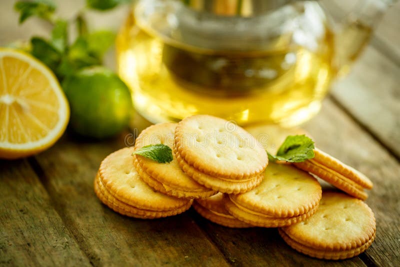 Lemon cookies with tea and mint