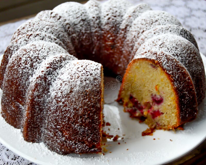 Lemon Cranberry Bundt Cake with Powdered Sugar royalty free stock photo Lemon Cranberry Bundt Cake with Powdered Sugar royalty free stock photo