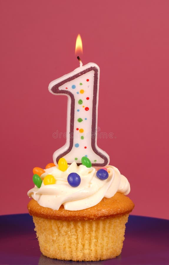 Lemon cupcake with buttercream and a  1 candle