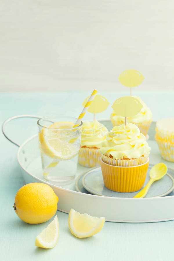 Lemon cupcakes stock photo. Image of homemade, blue, plate 49270038