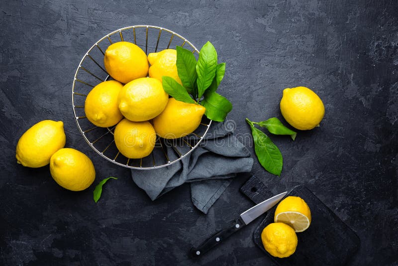 Fresh Lemons with Leaves, Summer Citrus Lemonade Ingredient Stock Photo
