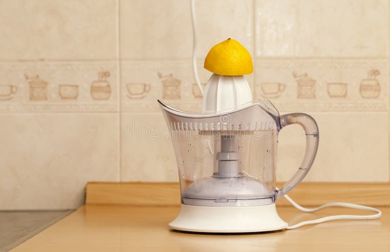 Lemon juice maker stock photo. Image of citrus, healthy 68762858