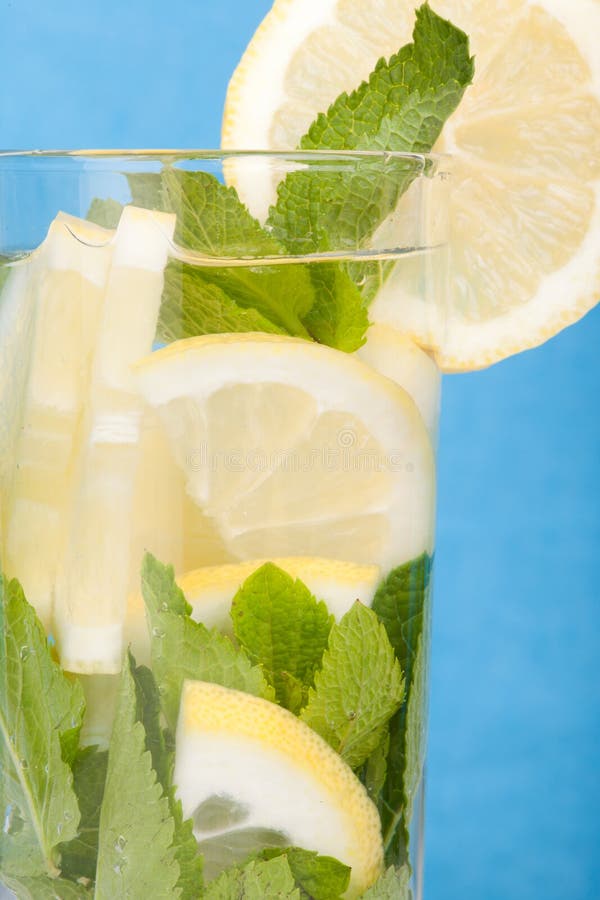 Lemon and mint in water stock photo. Image of filled 42894376