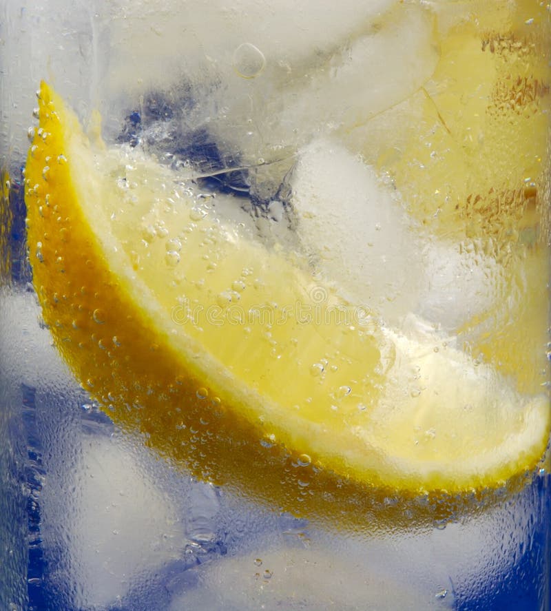 Lemon Wedge in Glass Mineral Water with Ice
