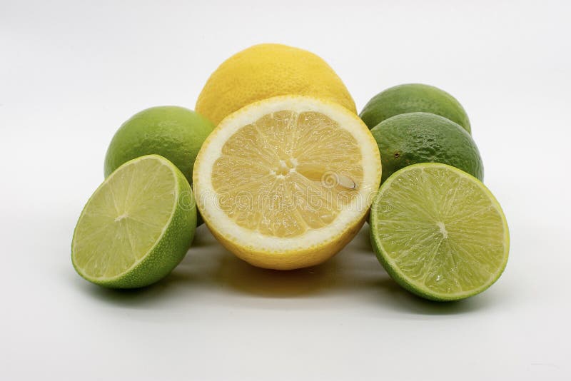 A Hand Full of Lemons and Limes Stock Photo Image of juice, citron