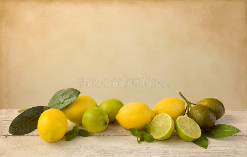 Lemons and limes on vintage table