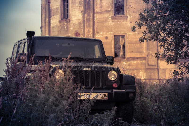 Leningrad Region, Russia , August 14, 2016 , Jeep Wrangler Abandoned Water  Tower Inca in the Leningrad Region, the Jeep Wrangler Editorial Stock Photo  - Image of cloud, fishing: 75848708