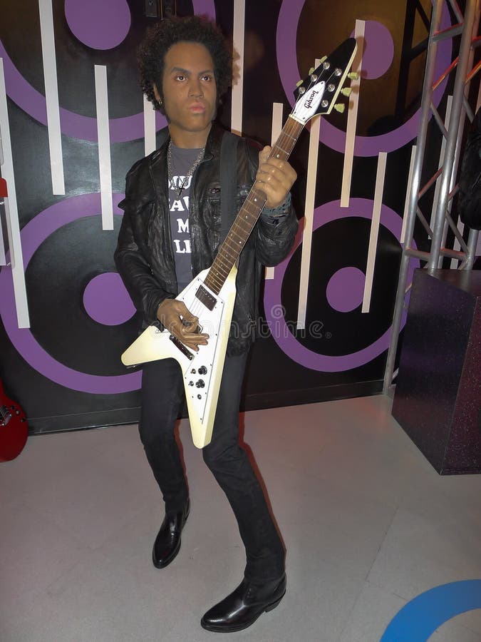 Lenny Kravitz wax statue at Madame Tussauds in Las Vegas Leonard Albert Lenny Kravitz (born May 26, 1964) is an American singer-songwriter, multi-instrumentalist, record producer, actor and arranger, whose â€œretroâ€ style incorporates elements of rock, soul, R&B, funk, reggae, hard rock, psychedelic, folk and ballads. In addition to singing lead and backing vocals, Kravitz often plays all the guitar, bass, drums, keyboards and percussion himself when recording.