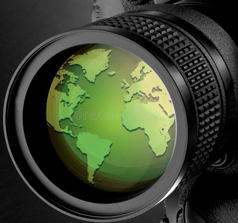 Image of world map on a camera lense. Image of world map on a camera lense