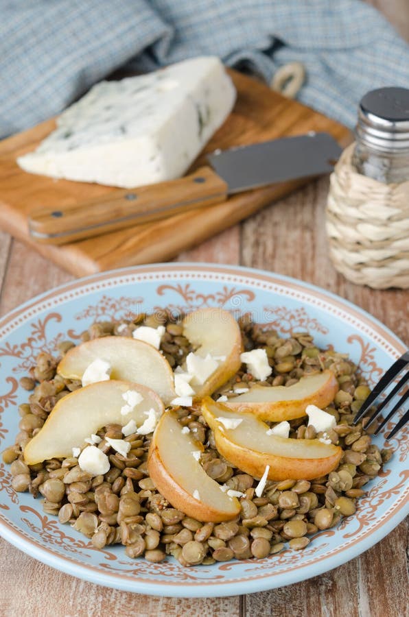 Lentil salad with caramelized pears closeup