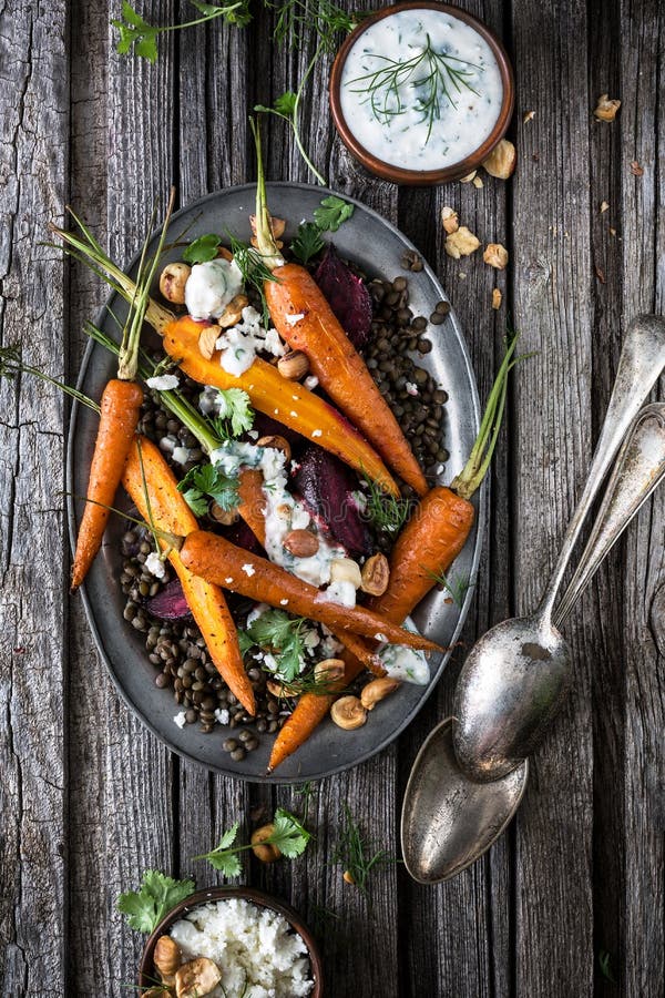 Lentil Salad with Roasted Carrots, Beetroots, Hazelnuts and Feta Sauce