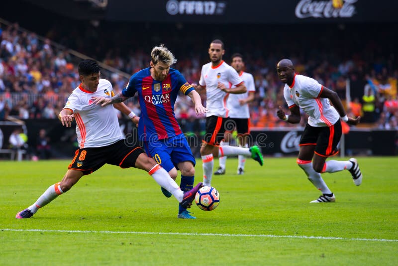 Leo Messi plays at the La Liga match between Valencia CF and FC Barcelona at Mestalla stock images
