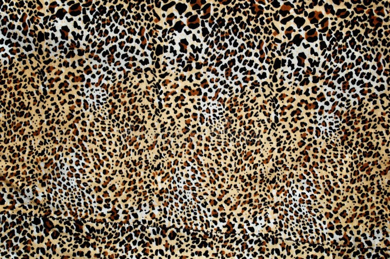 Leopardmuster-Gewebenahaufnahme für Hintergrundgebrauch lizenzfreies stockbild