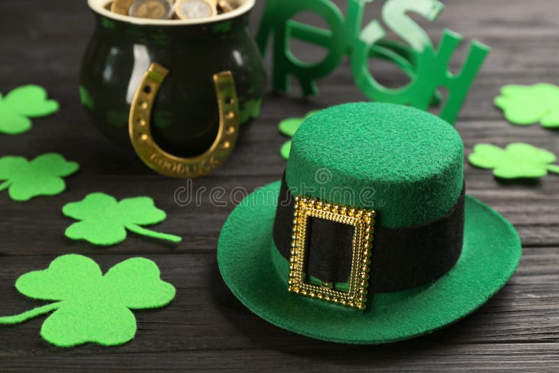 Leprechaun`s Hat and St. Patrick`s Day Decor on Black Wooden Table ...