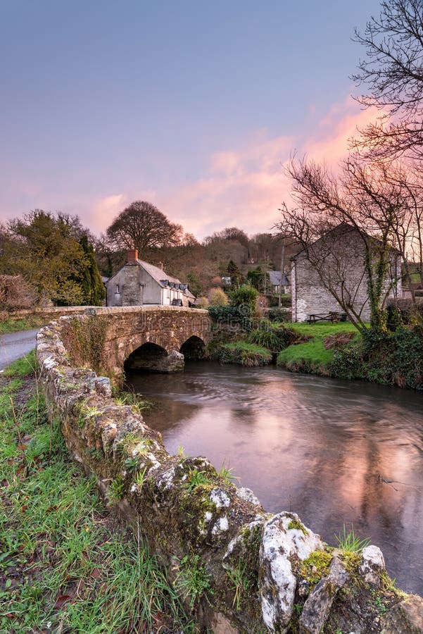 The Lerryn River as it flows under an old granite bridge at Couch's Mill near Lostwithiel in Cornwall. The Lerryn River as it flows under an old granite bridge at Couch's Mill near Lostwithiel in Cornwall