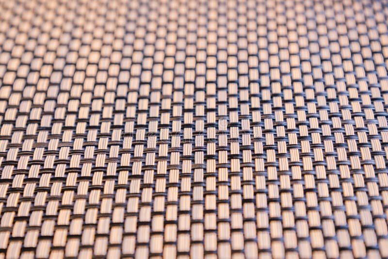 Les bandes en bambou tissées foncées et brun clair modèlent étroit Fond de texture photographie stock Les bandes en bambou tissées foncées et brun clair modèlent étroit Fond de texture photographie stock
