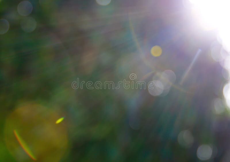 Les cercles abstraits du soleil et de la lentille évasent - fond photographie stock libre de droits Les cercles abstraits du soleil et de la lentille évasent - fond photographie stock libre de droits