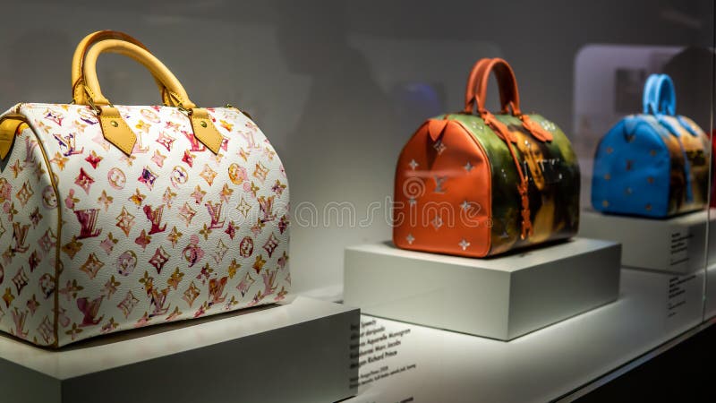 Kuala Lumpur, Malaysia - July 30, 2019: Louis Vuitton Keepall Bag collections showcase at the Time Capsule Exhibition by Louis Vuitton KLCC in Kuala Lumpur, accessory, background, beauty, brand, business, buy, casual, colorful, decoration, design, designer, display, editorial, elegance, elegant, expensive, famous, fashion, fashionable, glamour, handbag, history, leather, lifestyle, logo, look, luxurious, luxury, lv, market, modern, outfit, photography, rare, item, represent, retail, showing, store, street, stylish, trend. Kuala Lumpur, Malaysia - July 30, 2019: Louis Vuitton Keepall Bag collections showcase at the Time Capsule Exhibition by Louis Vuitton KLCC in Kuala Lumpur, accessory, background, beauty, brand, business, buy, casual, colorful, decoration, design, designer, display, editorial, elegance, elegant, expensive, famous, fashion, fashionable, glamour, handbag, history, leather, lifestyle, logo, look, luxurious, luxury, lv, market, modern, outfit, photography, rare, item, represent, retail, showing, store, street, stylish, trend