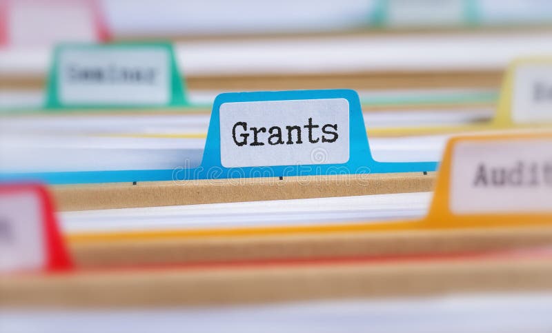 File folders with a tab labeled Grants. File folders with a tab labeled Grants