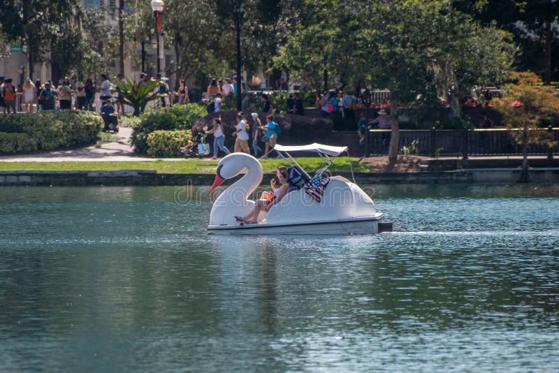 Orlando, Florida. October 12, 2019. Girls enjoying swan boat at Lake Eolar Park 1. Orlando, Florida. October 12, 2019. Girls enjoying swan boat at Lake Eolar Park 1