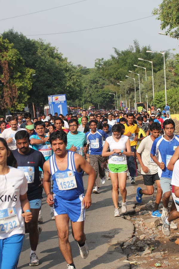 Bangalore, India - May 27: Professional athletes and other participants participate in Tata Consultancy Services World 10K Bangalore Marathon on May 27, 2012 in Bangalore, India. Bangalore, India - May 27: Professional athletes and other participants participate in Tata Consultancy Services World 10K Bangalore Marathon on May 27, 2012 in Bangalore, India.