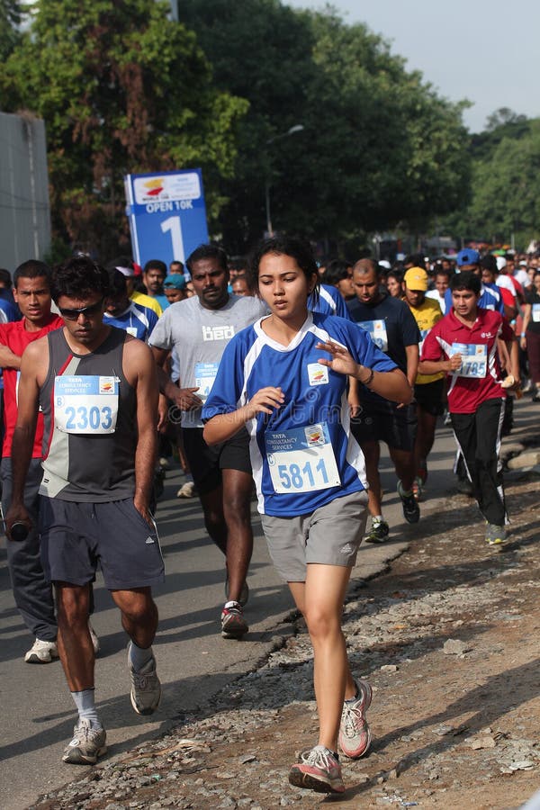 Bangalore, India - May 27: Professional athletes and other participants participate in Tata Consultancy Services World 10K Bangalore Marathon on May 27, 2012 in Bangalore, India. Bangalore, India - May 27: Professional athletes and other participants participate in Tata Consultancy Services World 10K Bangalore Marathon on May 27, 2012 in Bangalore, India.