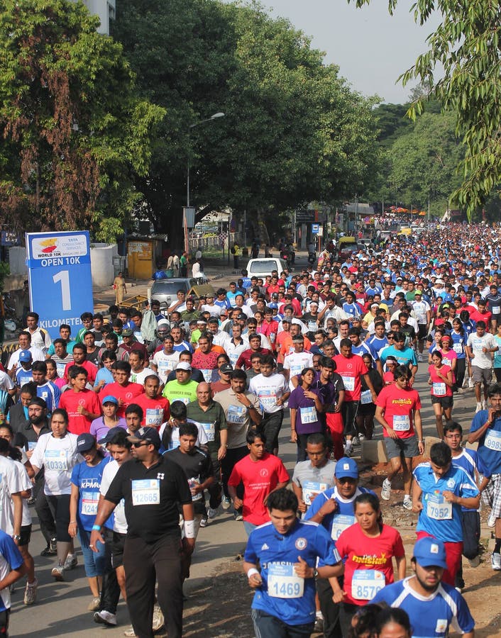 Bangalore, India - May 27: Professional athletes and other participants participate in Tata Consultancy Services World 10K Bangalore Marathon on May 27, 2012 in Bangalore, India. Bangalore, India - May 27: Professional athletes and other participants participate in Tata Consultancy Services World 10K Bangalore Marathon on May 27, 2012 in Bangalore, India.