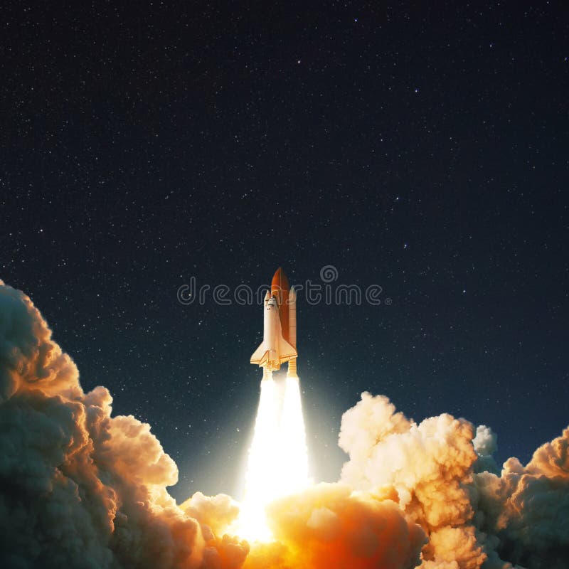 The space shuttle rockets launch into space on the starry sky. spacecraft flies into space with clouds of smoke. Concept. The space shuttle rockets launch into space on the starry sky. spacecraft flies into space with clouds of smoke. Concept