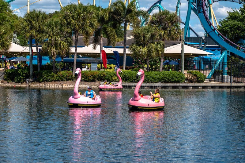 Orlando, Florida. March 14, 2020. People enjoying paddle swan boats at Seaworld 1. Orlando, Florida. March 14, 2020. People enjoying paddle swan boats at Seaworld 1.