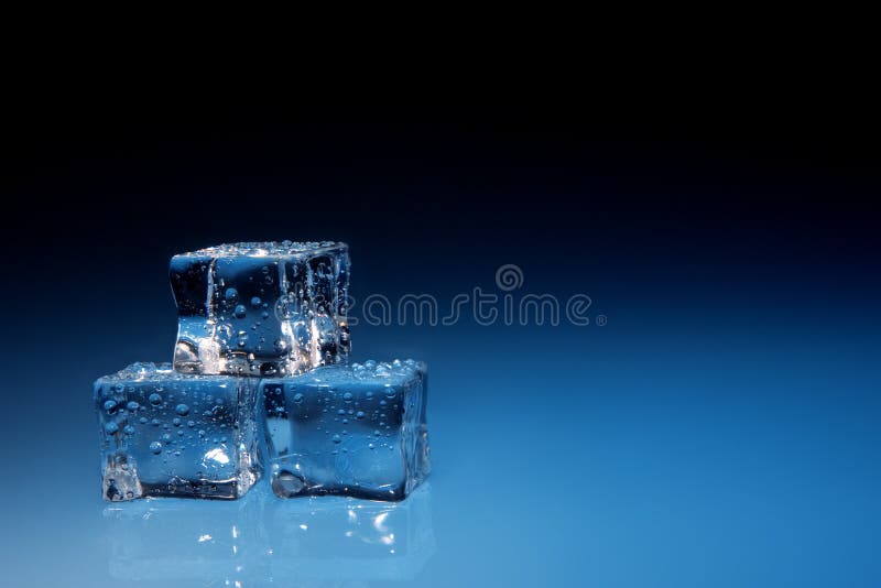 Ice cubes with water drops on blue background. Ice cubes with water drops on blue background