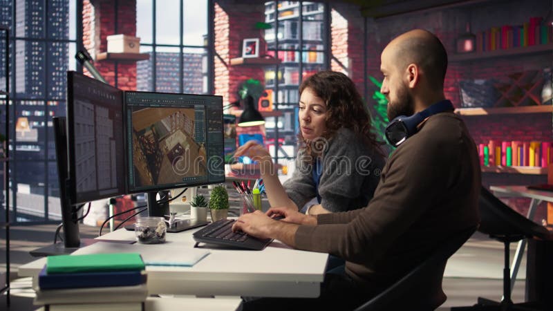 Les graphistes utilisent un logiciel d'architecture sur PC pour créer un rendu 3D détaillé clips vidéos