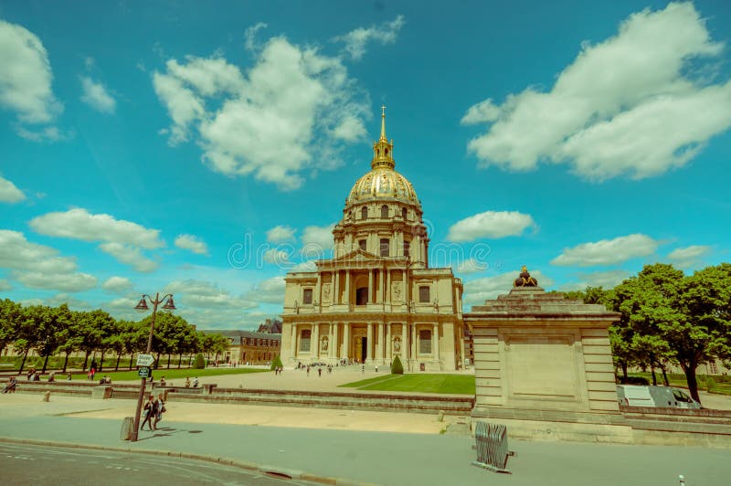 PARIS, FRANCE - JUNE 1, 2015: Les Invalids, The National Redisdence of the Invalids, complex of buildings in Paris relating to the military history of France. PARIS, FRANCE - JUNE 1, 2015: Les Invalids, The National Redisdence of the Invalids, complex of buildings in Paris relating to the military history of France