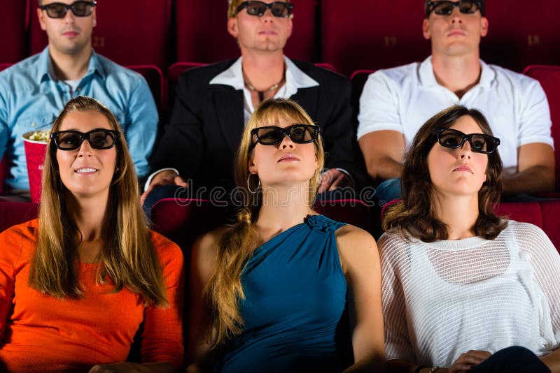 Young people strained watching 3d movie at cinema. Young people strained watching 3d movie at cinema