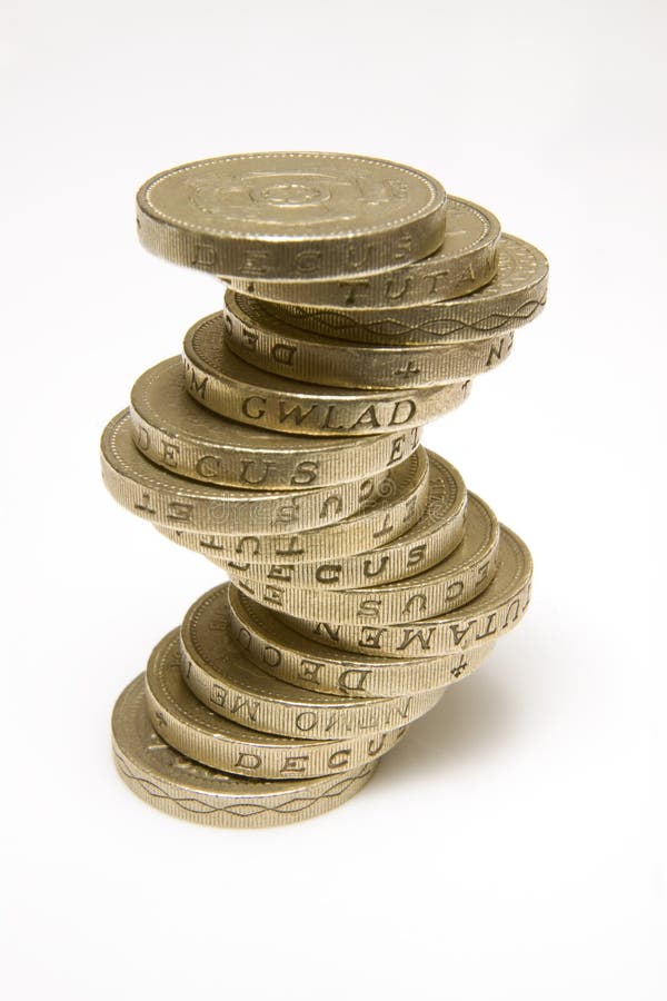les pièces de monnaie britanniques empilent livre photographie stock libre de droits les pièces de monnaie britanniques empilent livre photographie stock libre de droits