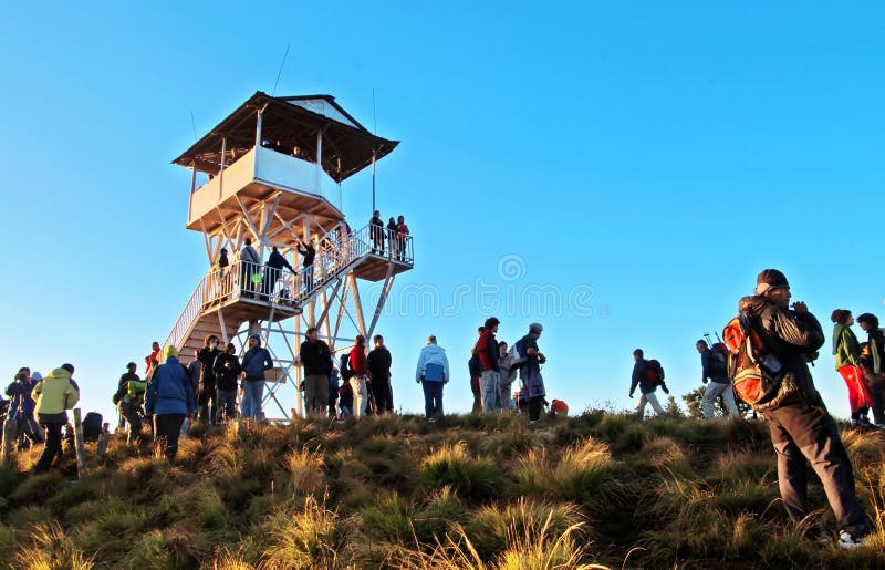 Tourists meet the sunrise at top of Poon Hill in Himalayas, Nepal. Tourists meet the sunrise at top of Poon Hill in Himalayas, Nepal