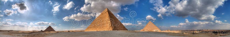 Huge panorama of the three pyramids in Giza Necropolis with Cairo in the background. Huge panorama of the three pyramids in Giza Necropolis with Cairo in the background