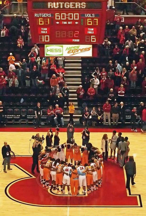 Following their basketball game Rutgers and Tennessee asketball players link arms at the Rutgers Athletic Center in Piscataway, New Jersey on December 12, 2013.  In 2007 these schools played for the NCAA national championship in 2007.  The Lady Vols won that battle and this one as well. Both teams were coached by Hall of Fame Coaches; Pat Summitt for Tennessee and C. Vivian Stringer for the Rutgers Scarlet Knights. Summit retired in 2012 and died from Alzheimer`s 4 years later at the age of 64. Following their basketball game Rutgers and Tennessee asketball players link arms at the Rutgers Athletic Center in Piscataway, New Jersey on December 12, 2013.  In 2007 these schools played for the NCAA national championship in 2007.  The Lady Vols won that battle and this one as well. Both teams were coached by Hall of Fame Coaches; Pat Summitt for Tennessee and C. Vivian Stringer for the Rutgers Scarlet Knights. Summit retired in 2012 and died from Alzheimer`s 4 years later at the age of 64.