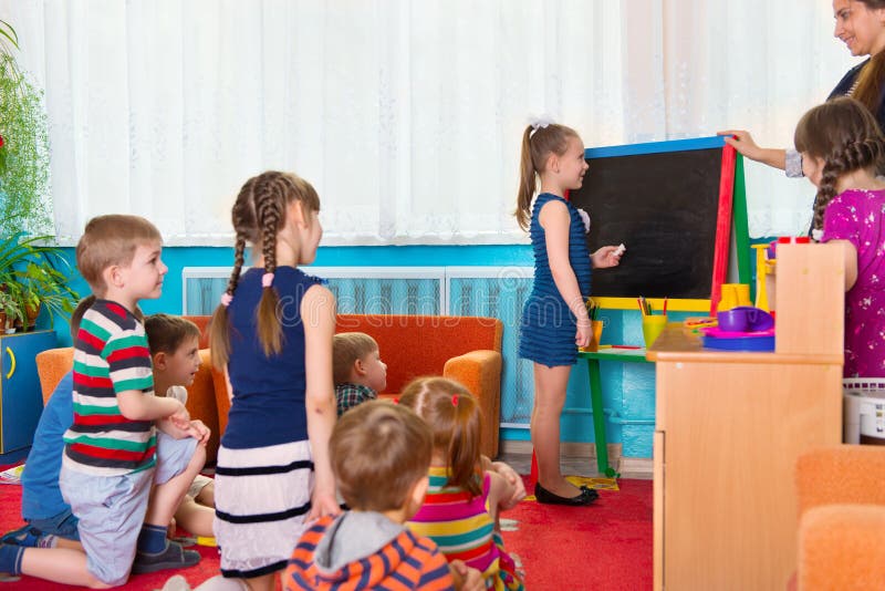 Lesson at kindergarten royalty free stock photography