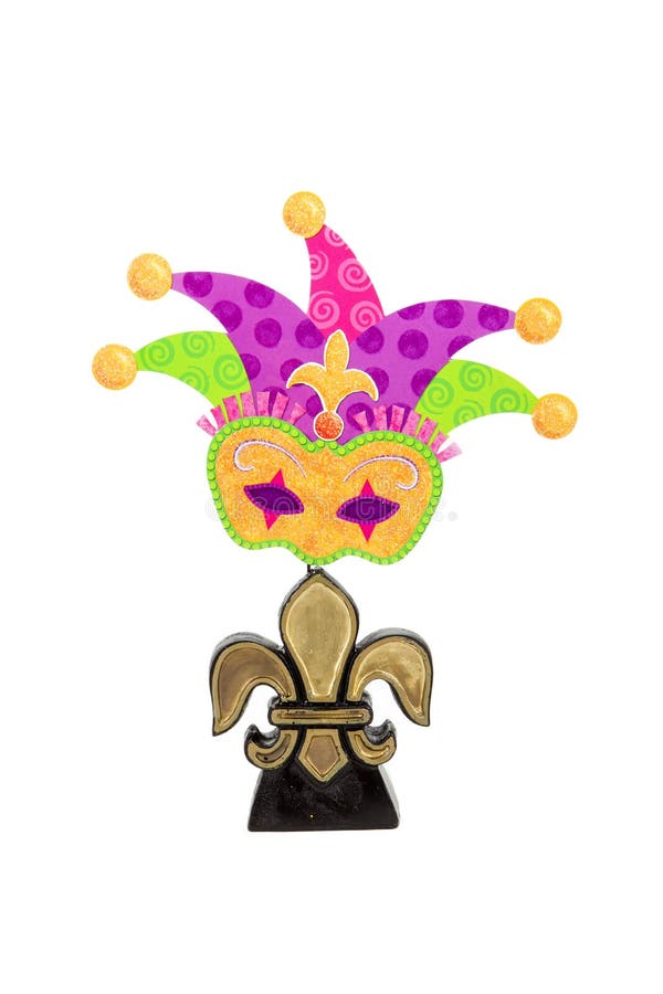 A fleur de lis with a jester mask against a white background. A fleur de lis with a jester mask against a white background