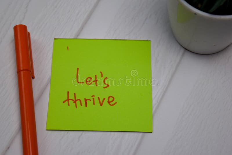 Let`s Thrive write on sticky note isolated on wooden table. Word thrive stock images, royalty-free photos and pictures