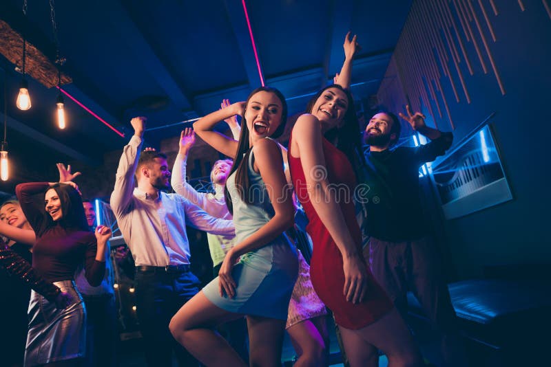 Lets party. Low angle view photo of cheerful wild crowd people dance on disco floor celebrate high-school graduation royalty free stock photo Lets party. Low angle view photo of cheerful wild crowd people dance on disco floor celebrate high-school graduation royalty free stock photo