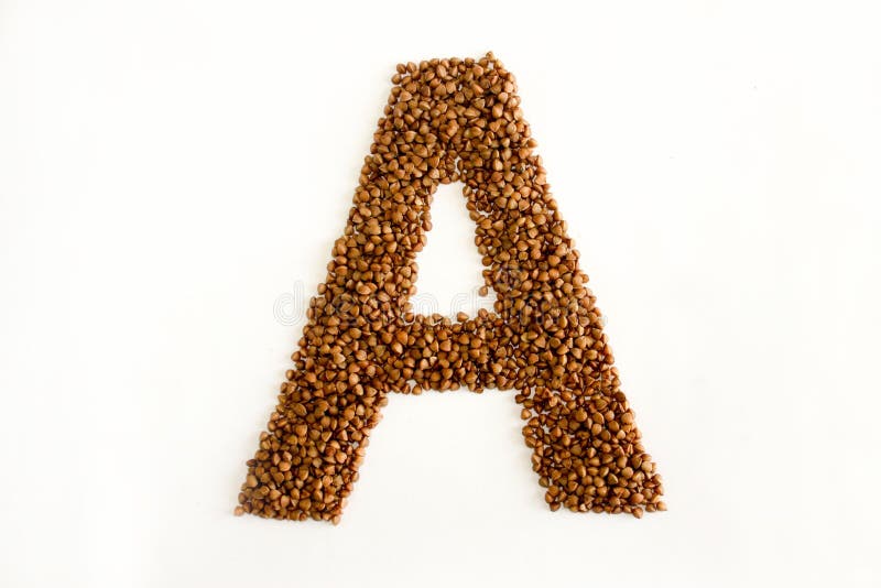 English Alphabet. Hand Made Edible Letters From Buckwheat. Font Made Of  Cereal Isolated On White. Lettering. Russian Natural Useful Dietary  Product. Top View Flat Lay Stock Photo, Picture and Royalty Free Image.