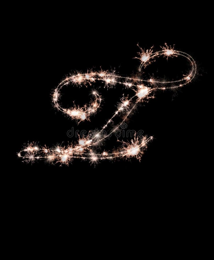 The letter t made from sparks of Bengal lights isolated on a black background. beautiful letters