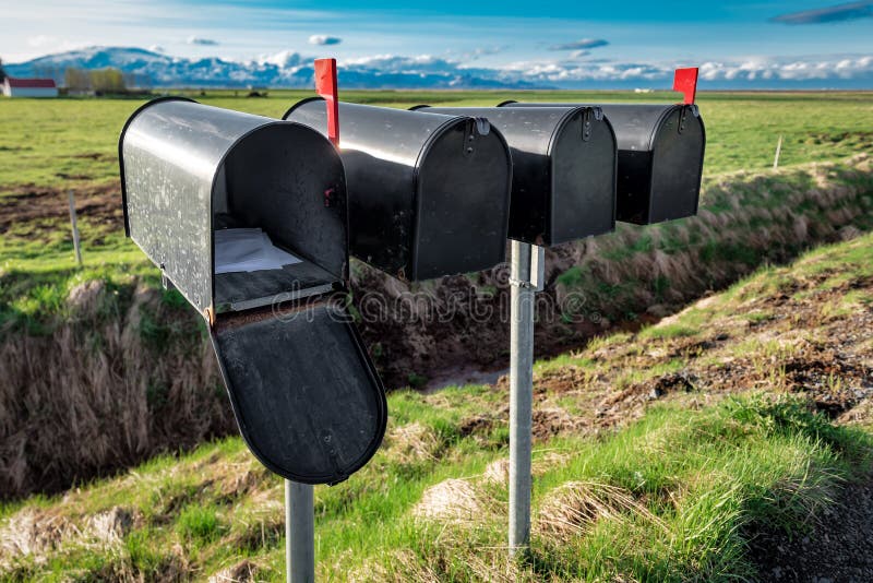 Letters in black mail box stock photography