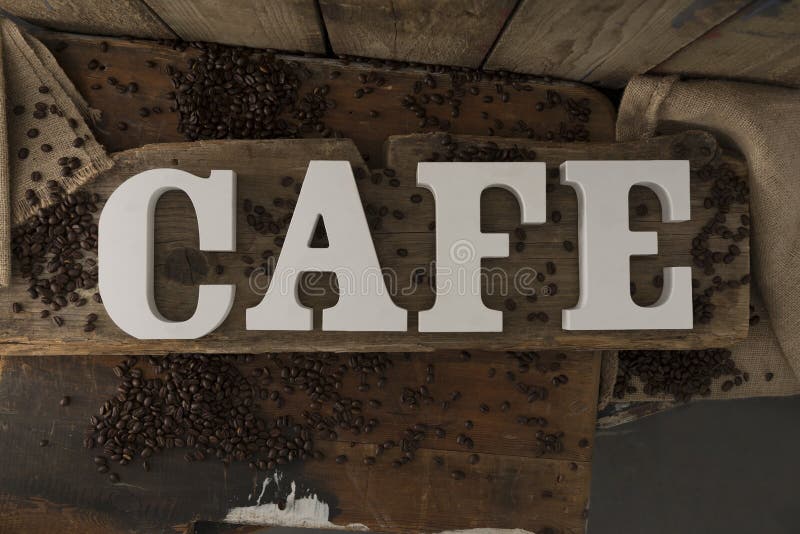 Letters Spelling CAFE on Rustic Wooden Surface Stock Image Image of