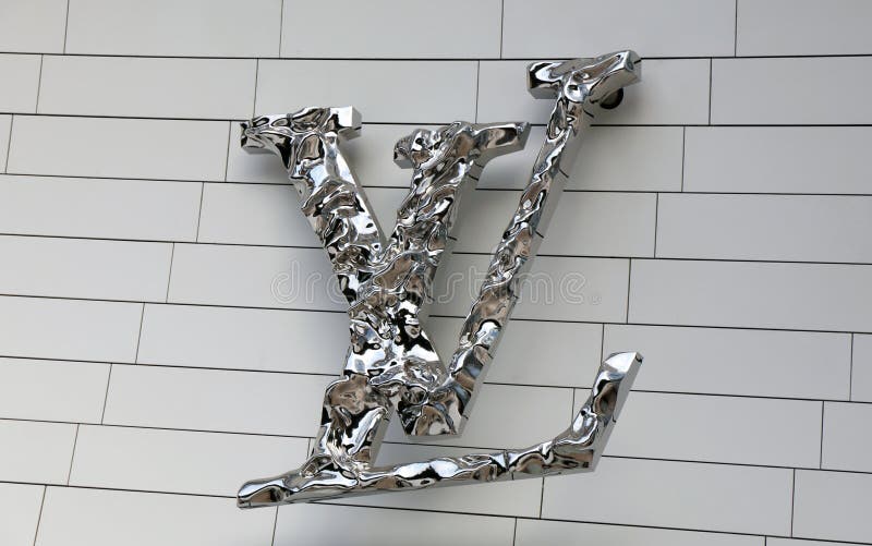 Letters Louis Vuitton on a Wall Editorial Photography - Image of famous,  luxury: 127106472